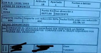 multa brazo fuera